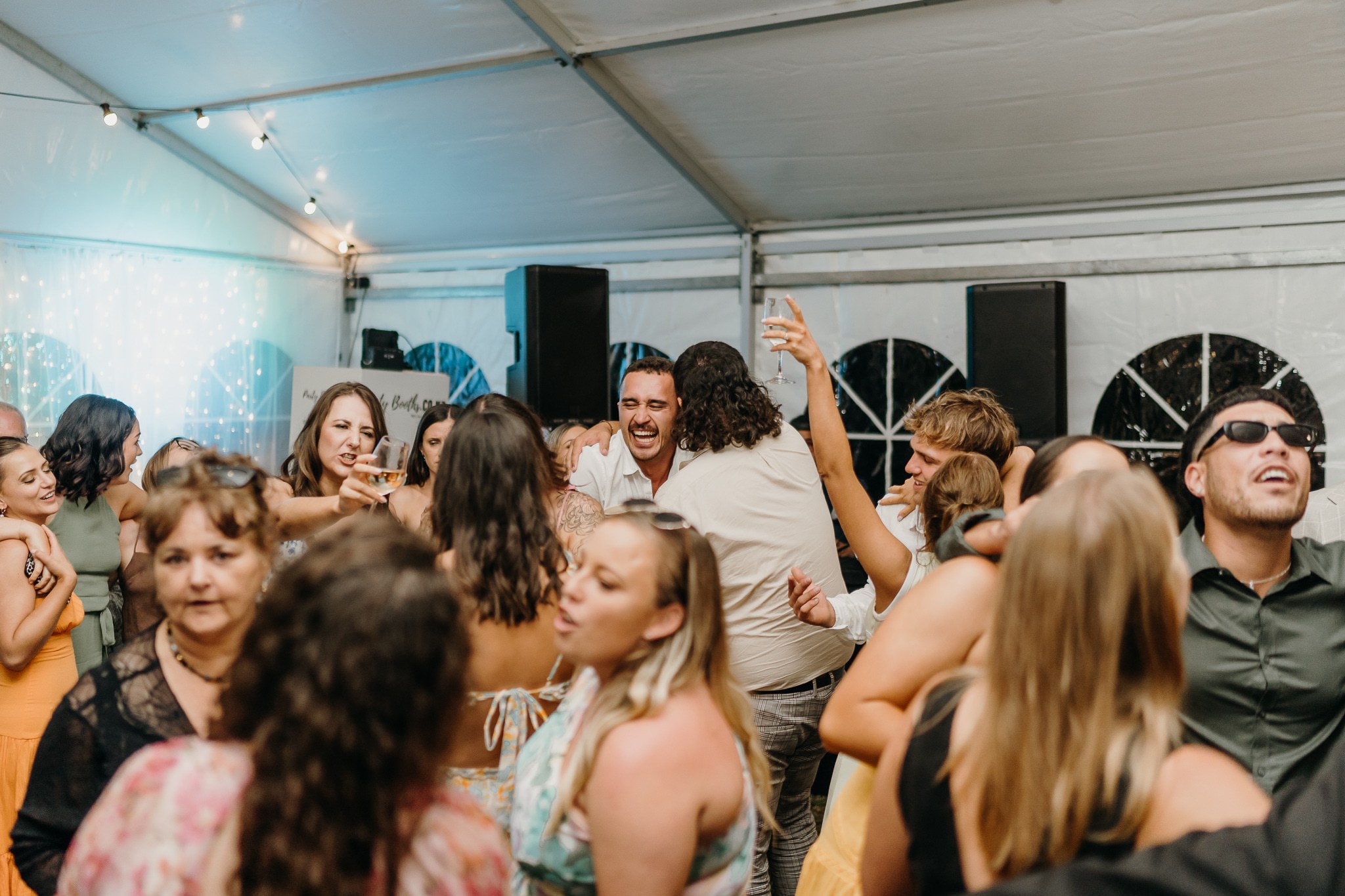 Wedding guests enjoying a crowded dancefloor